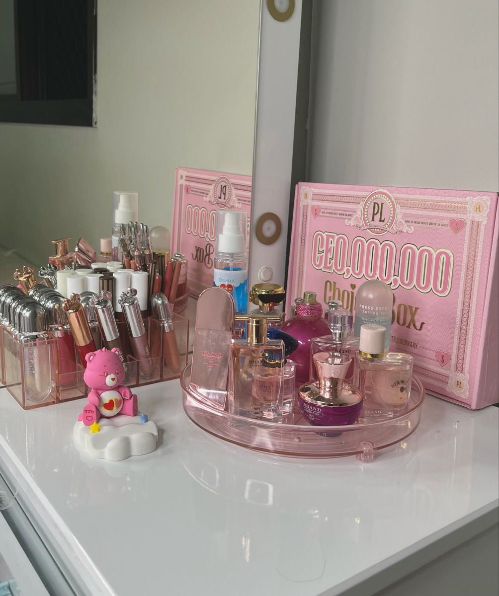 Rotatable perfume organizer in pink clear