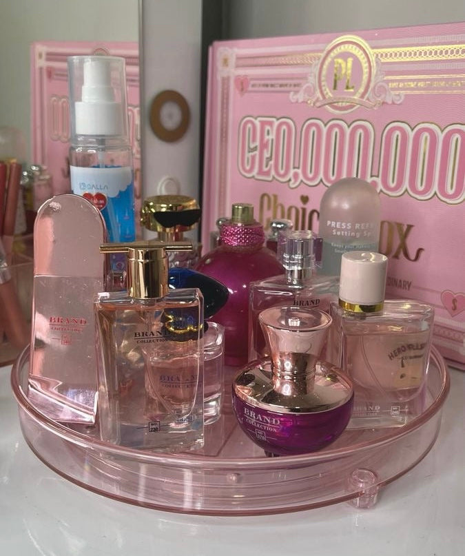 Rotatable perfume organizer in pink clear